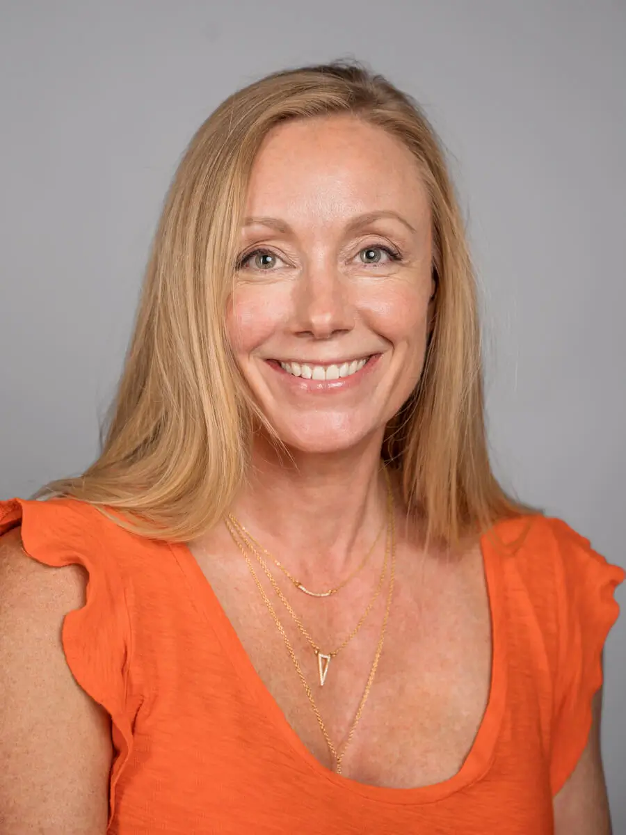 Staff headshot of Crystal Fitzpatrick in front of a neutral background